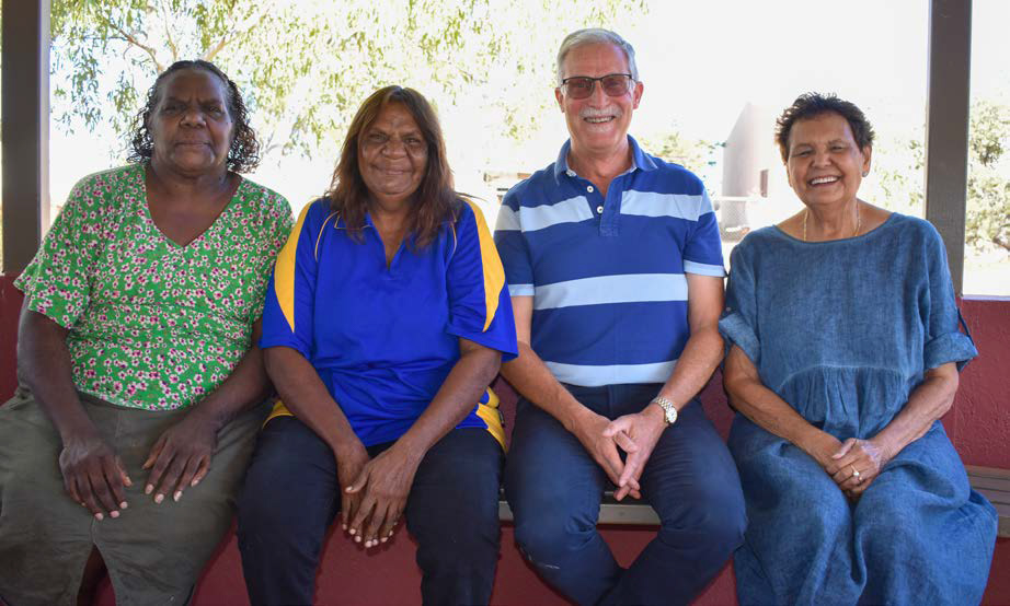 Supermarket chair and volunteers