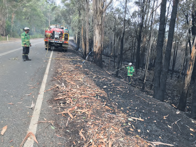 Crew hose down fire field