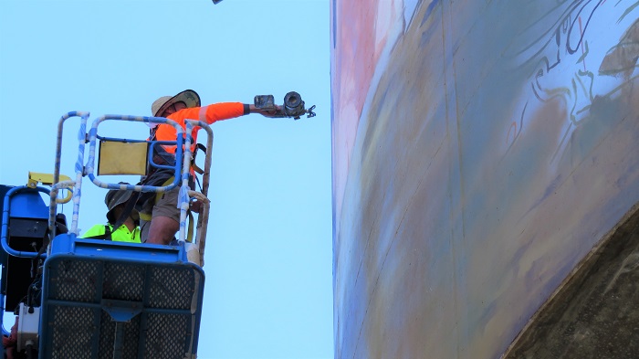 Casino water tower mural in progress