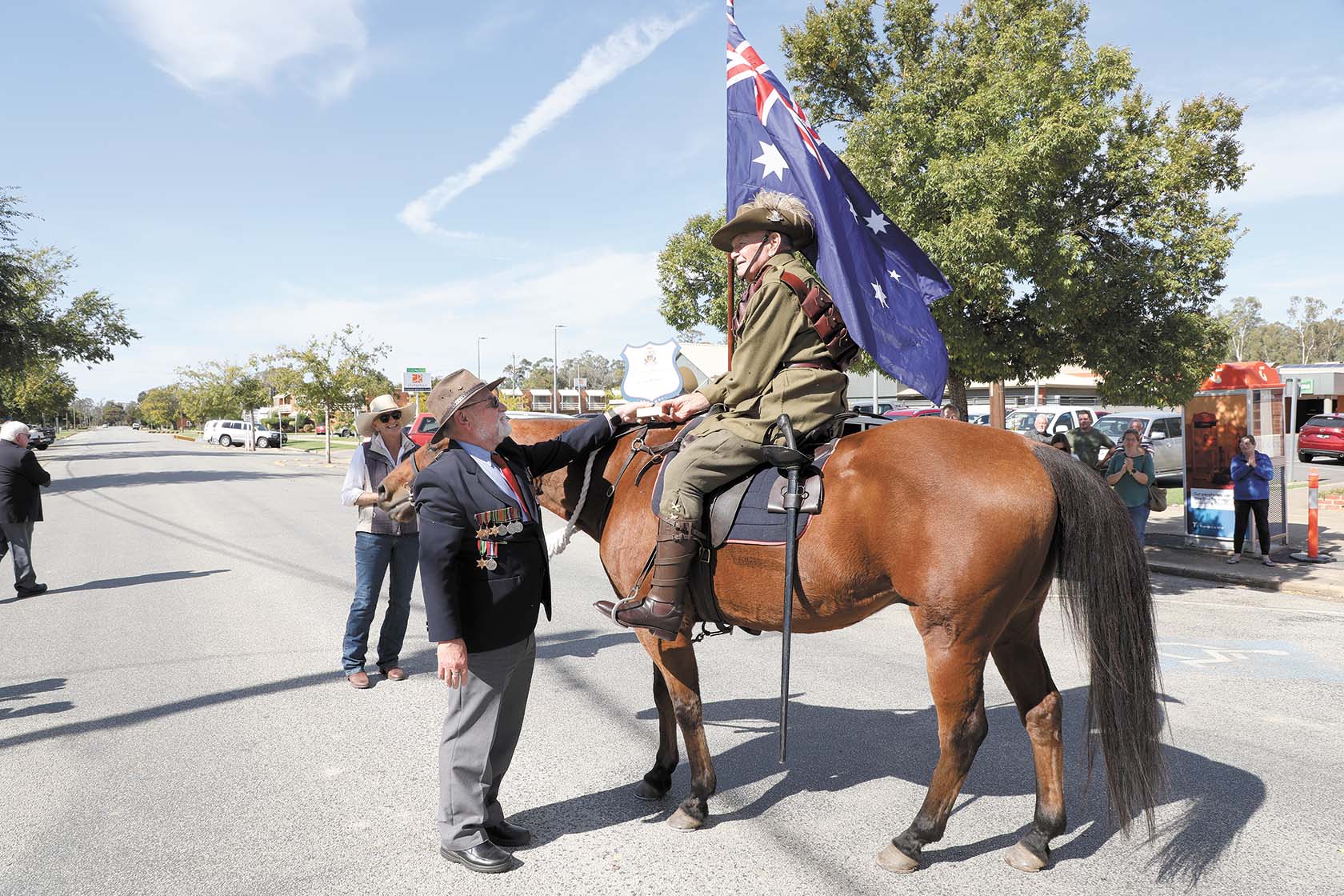 Greg Hall presents plaque to George Rathbone