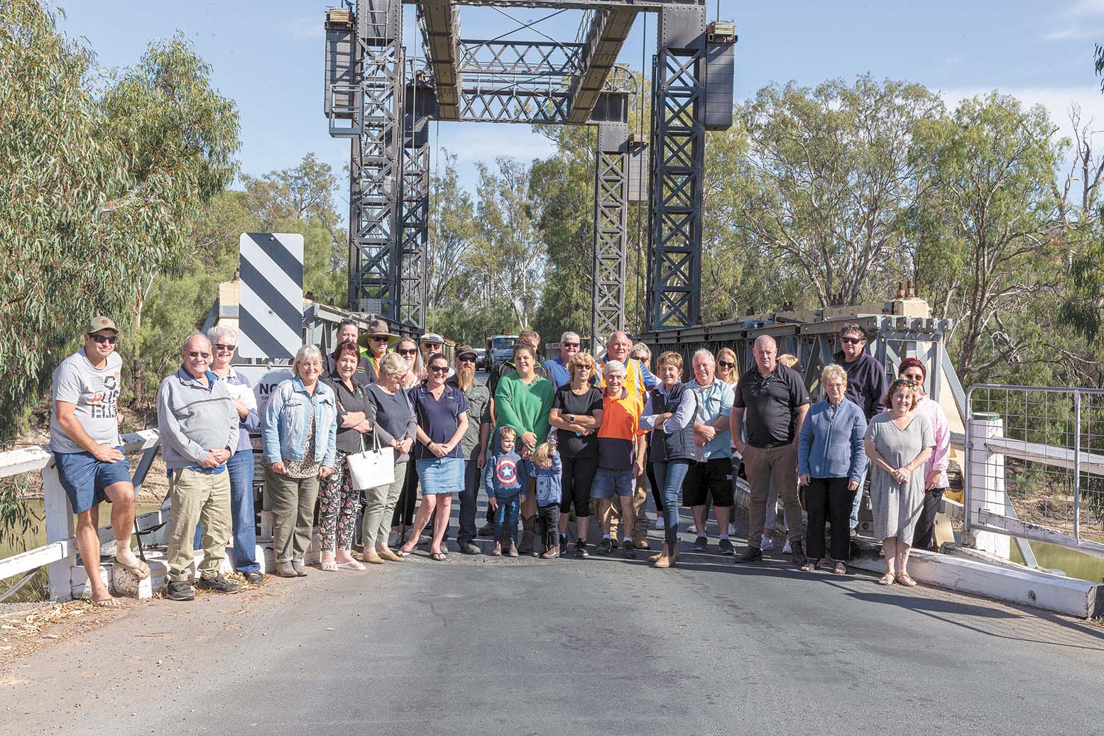 Tooleybuc residents on bridge