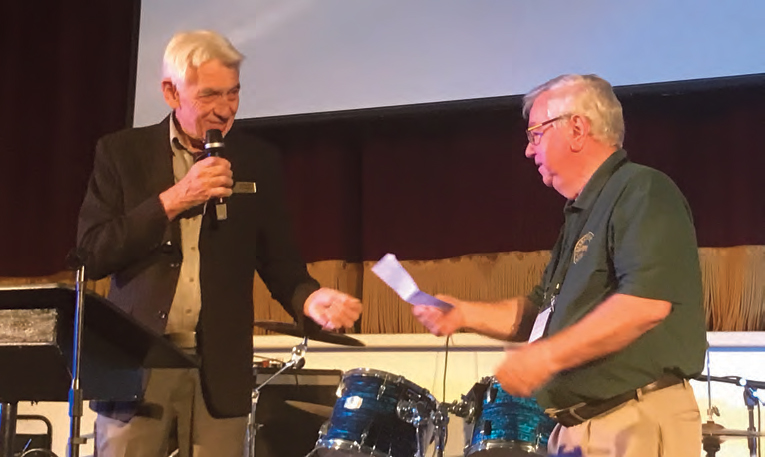 Mayor presenting cheque to Veteran Car Club