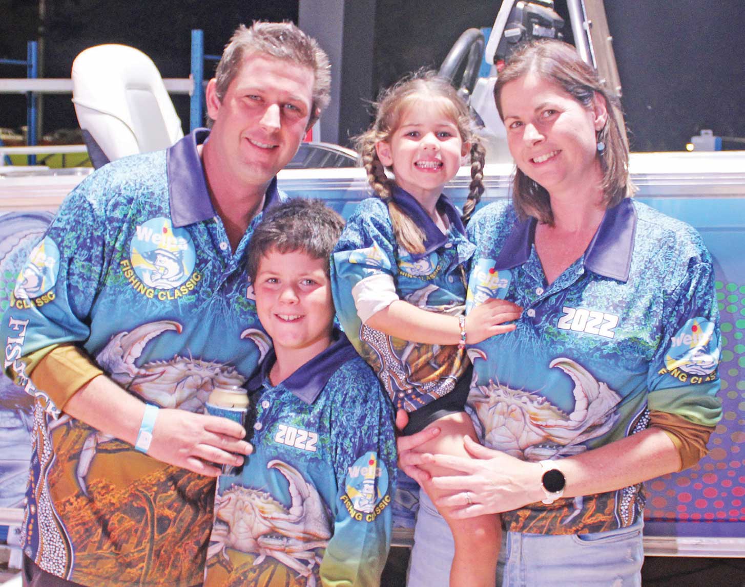 Winners of the first prize boat – Chris Hamill and wife Lani with Lachie and Miley.