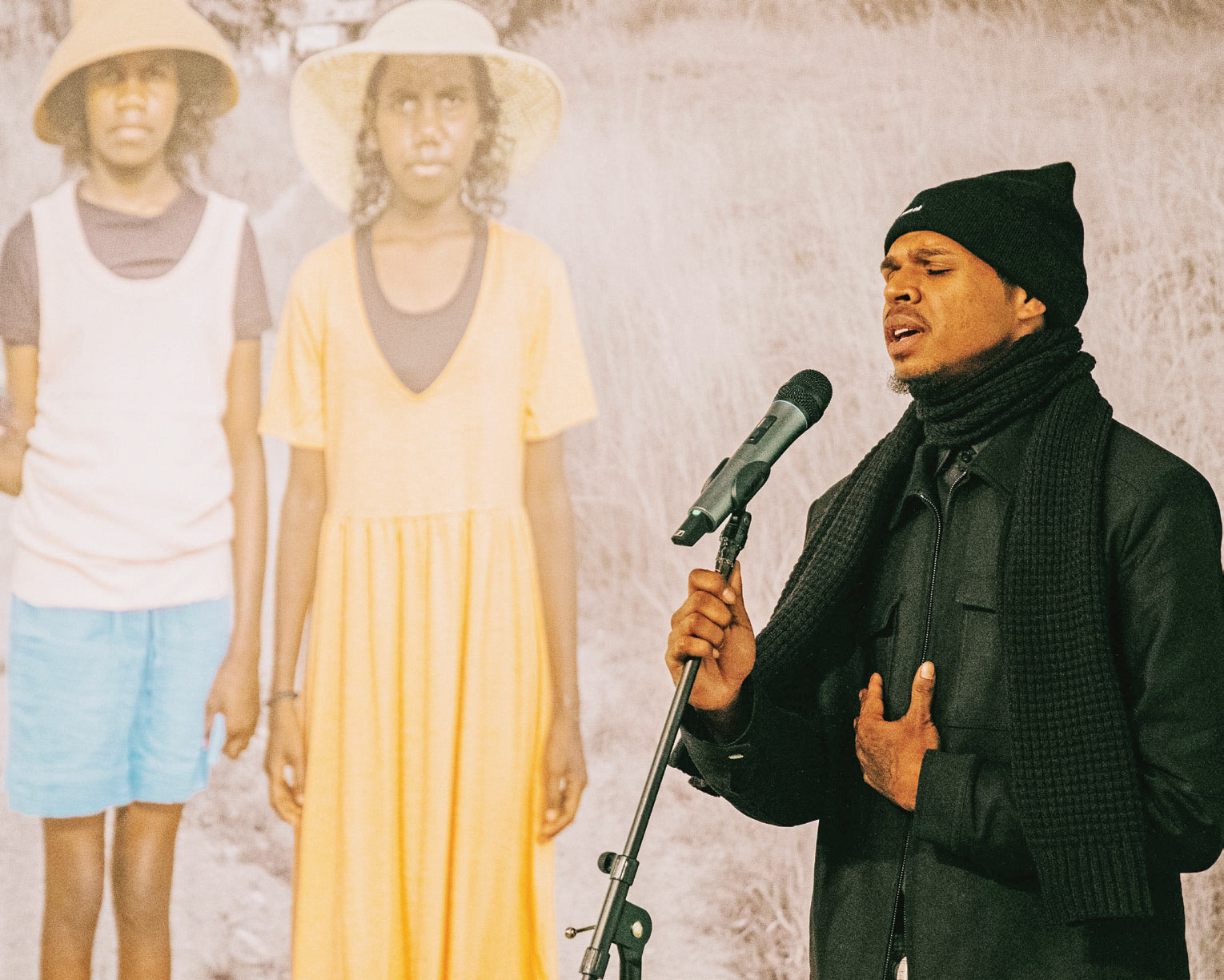 Colin Kepple sings Bright Lights at the opening of the Adolescent Wonderland exhibition.