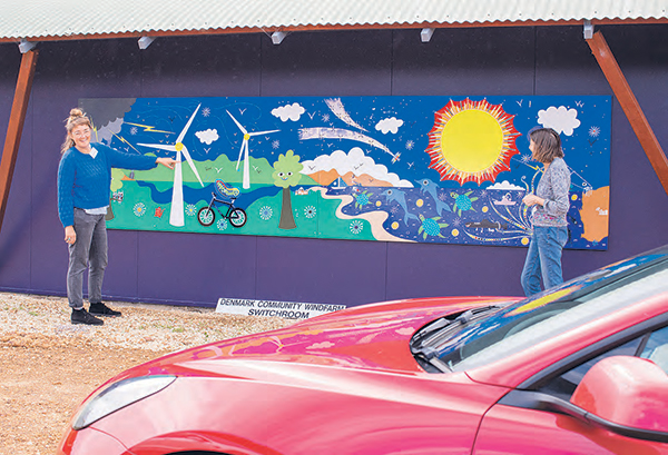 Volunteers Rhian Thomas with Gaynor Mitchell at the new mural.
