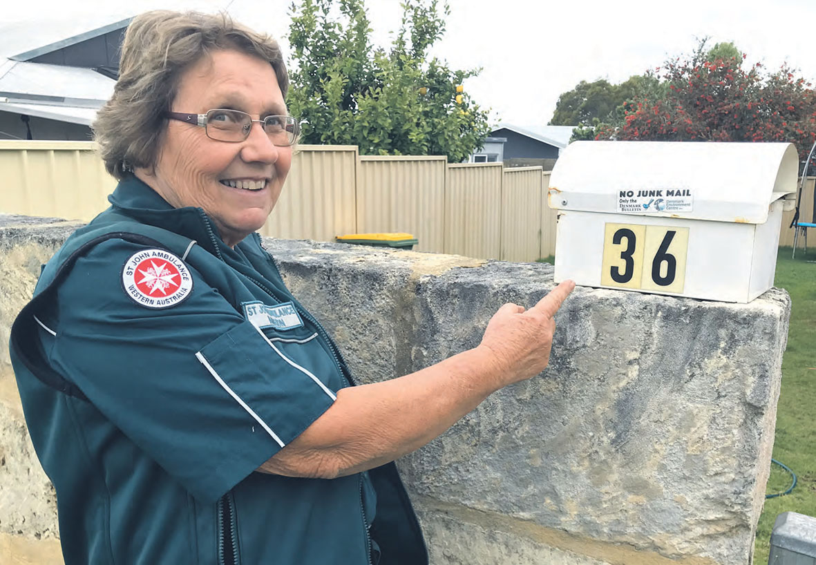 Mary MacDougall with a visible street number