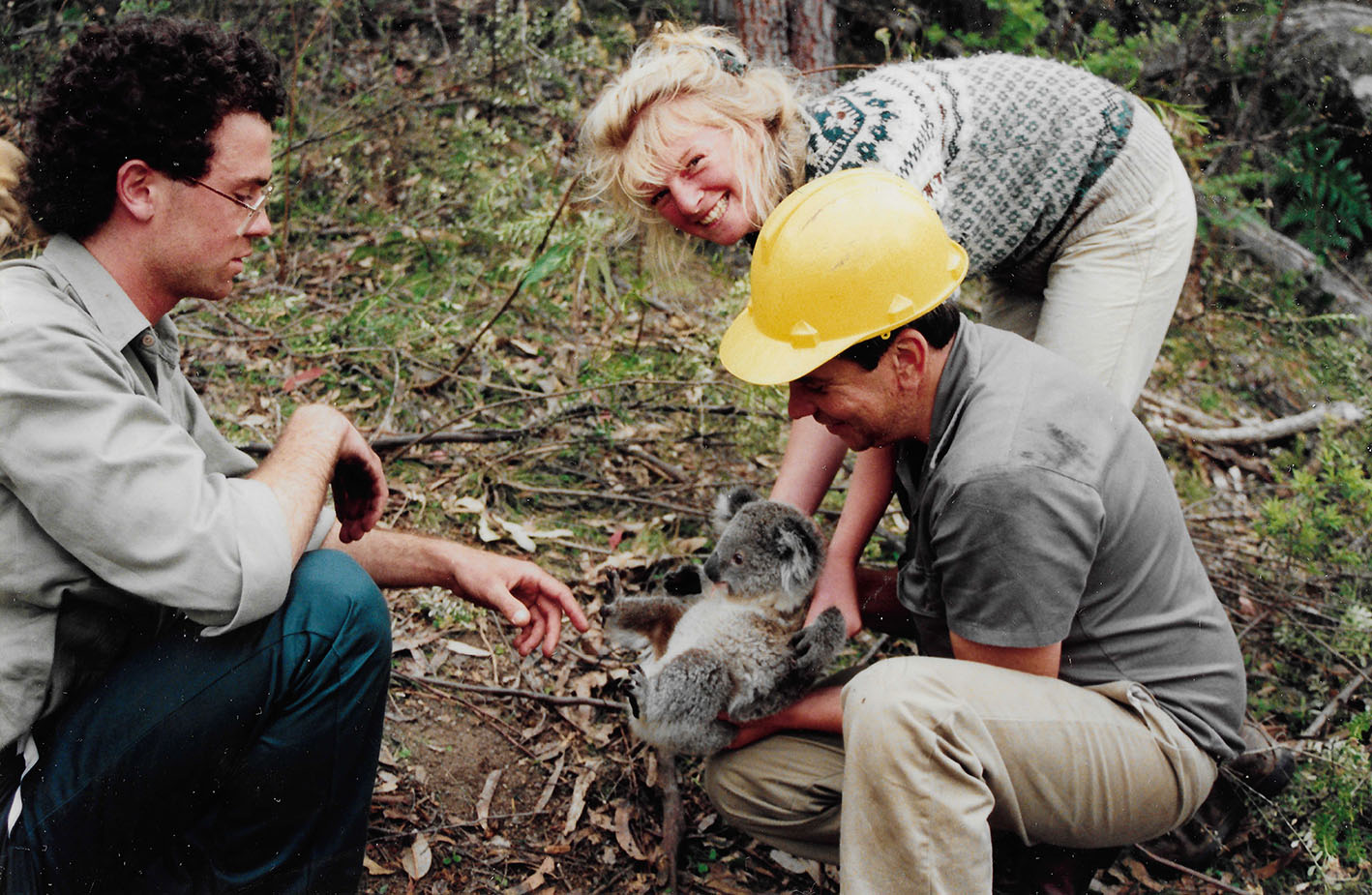 Vic Jurskis and colleagues with joey at Tantawangalo