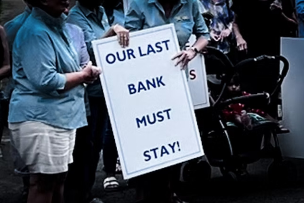 Our last bank must stay placard