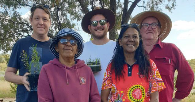 CSU researchers with locals