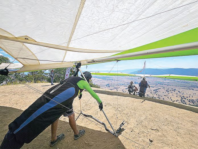 Pilots prepare to launch from Mt Elliot